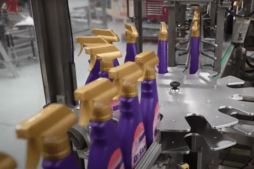 Packer Cleaner Wraparound Casepacker Packing Bottles of Spray Cleaner - HMPS