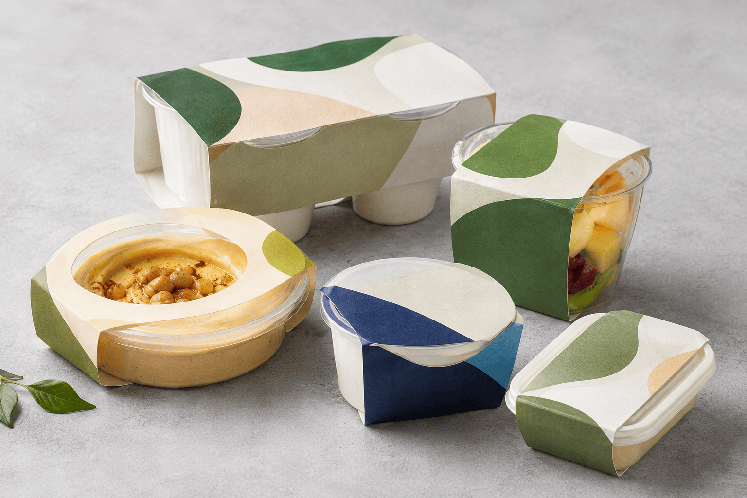 Sleeved hummus pot, fruit cup, yoghurt tub and twin-pot dip carrier